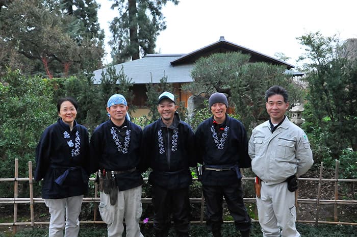 Landscape designer Takuhiro Yamada and his pruning crew