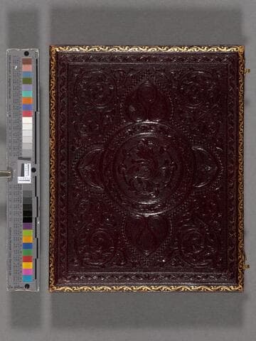 Postmortem photograph of child Margaret Hereford Wilson, lying on a bier with flowers around her