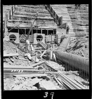 View of east 42" pipe in place at upper end and forms for bearing walls center and west lines above wye