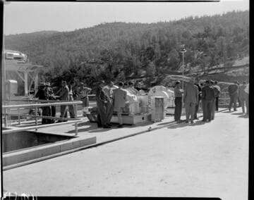 Crowd of people on the crest of Dam 7 touring the dam probably during the dedication of the Big Creek 4 project