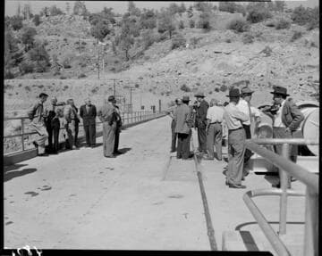 Crowd of people on the crest of Dam 7 touring the dam probably during the dedication of the Big Creek 4 project