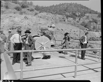 Crowd of people on the crest of Dam 7 touring the dam probably during the dedication of the Big Creek 4 project