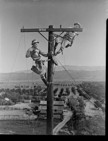 Electrical Times cover: composite photo of linemen on pole