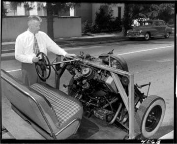 Close-up of 3 wheel vehicle front end and motor