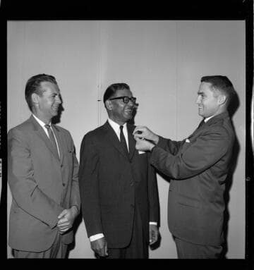 Man receiving service award