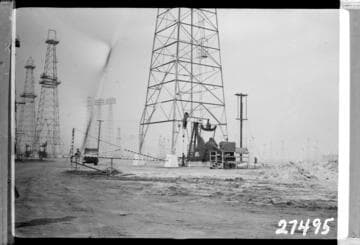 Long Beach Steam Station, Plant #3 - From north fence of Long Beach Steam Plant looking north past U. P. offset well #E-7 along road & dikes to channel towers