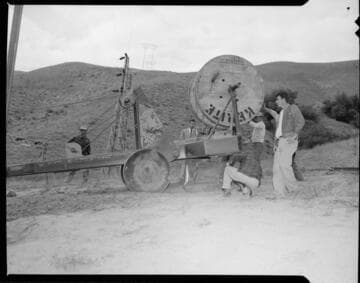 Electrical construction workers stringing conductor at Gorman Substation