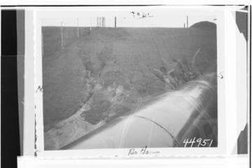 Long Beach Steam Station, Plant #3 - West slope of dike at entrance channel peak No. property fence showing gullying