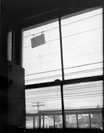 Power lines close to building and fire escape