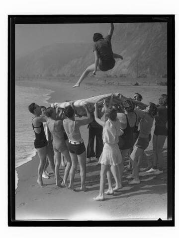 Mary Prince in beach blanket toss, Santa Monica