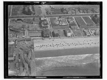Aerial detail of Santa Monica Pier and beach south of pier