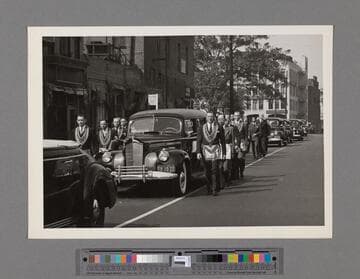 Funeral service for Peter SooHoo, hearse flanked by Masons in the funeral procession