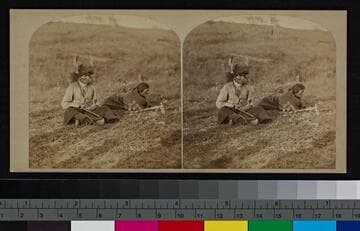 Two Winnebago Indian men in a field