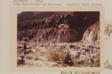 Chopper bringing in crew and equipment including a Sportyak to 217 Mile Rapid