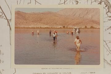 Members of the party with Grand Canyon Expeditions return to floats after freeing Jim Jordan's houseboat near Gods Pocket