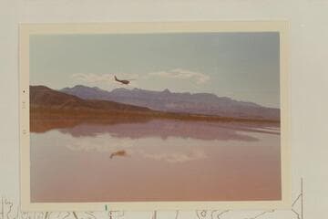 Chuck Rowland checks progress of deck boat on Lake Mead above Gods Pocket
