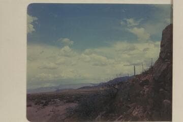 Valley at foot of Grand Wash Cliffs from the Highway 66.  This open wash is a natural route to follow for a man such as James White who was escaping the San Juan country and staying out of sight