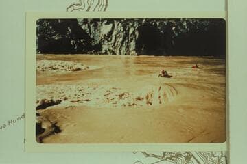 Homer Morgan and Jorgen Visbak drifting into rapid at about Mile 212.15