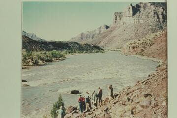 The Wright party studies the rapid at Mile 41.5, Desolation Canyon