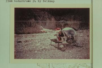 Helicopter on the beach at 217 Mile Rapid.  Reconnaissance of Wilding, Inc