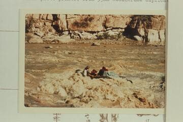 George Stewart's 10-man swingi8ng clear of the hole in Coal Creek Rapid although the motor had drowned