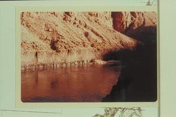 Lava crystals near edge of river, about Mile 193.5
