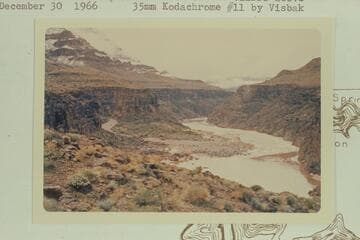 Down to 217 Mile Rapid with snow on the cliffs above