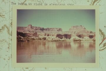 Southwest across Millard Canyon Benches to North Point and the Orange Cliffs.  The butte at right is elevation 5760