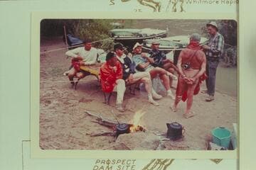 The crew of the Bureau of Reclamation cruise at breakfast after the rain during the night.  Foot of the Whitmore Trail, Mile 188.3.  Left to right:  Buzz Belknap, Jordan, Valentine, Bechtel, Komie, Marston  and Borland
