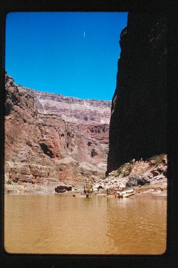 Up to chopper on dock; Marble Canyon Dam site