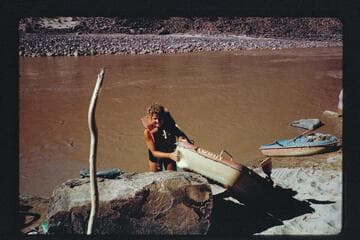 Robin Segerblom shows dent in her Sportyak; Hance Rapids