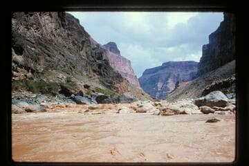 Belknap in Sportyak at foot of Vulcan Rapids