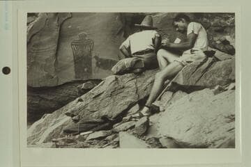 Hoffman Birney and Barney Hughs in cave near mouth of Hog Canyon, North Wash, near Glen Canyon of the Colorado River