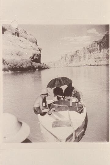 Nevills 1940 party in Glen Canyon.  Del Reed sits on the gunwale of the "Joan."