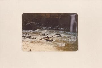 Hitting a rock at Dark Canyon Rapid