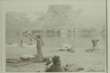 Cataract Canyon, Wright-Rigg party.  Joe Dudziak showing broken ribs; Jim Rigg trying to wake up