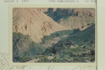 Bed of Crystal Creek below the mouth of Dragon Creek and showing the scouring and deposits from the flood of 1966, Dec