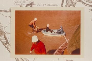 Dock Marston and Helen Stiles being lightered from Tex's jet boat to an island after the jet had grounded.  The Portal