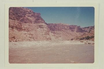 Up river at the foot of the rapid below the mouth of Range Canyon.  Approximately Mile 204.65