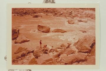 Dock Marston and Buzz Belknap check the Best and McDonald inscriptions at Mile 204 1/2, right bank, Cataract Canyon