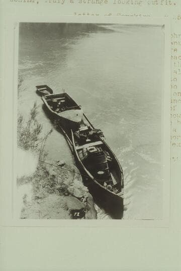 Tandem rig of motor boats towing a 10-ft. fold-flat boat.  Colorado River between Moab and The Junction