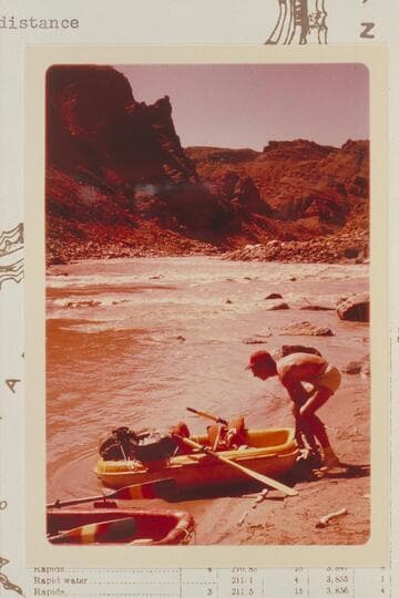 Jorgen Visbak launches his Yak at head of Rapid #7, Mile 209.6 RB.  Y and Cross Canyons in the distance