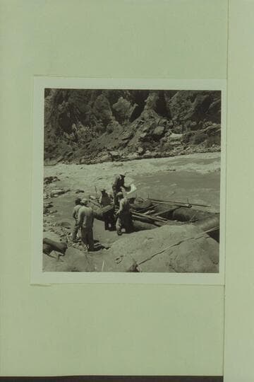 9.  Head of Lava Falls.  Unloading Pontoon No. 2.  Jack, Harry, Phil, Doug, and Smuss