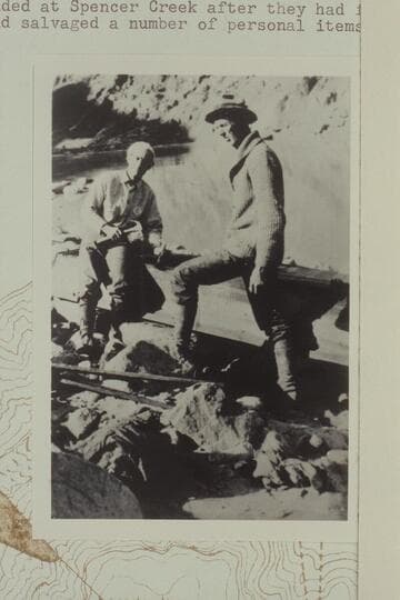 Reith Hyde is at right as he checks with Emery Kolb about the run from Diamond Creek down to Mile 237 where the sweep-scow had been sighted