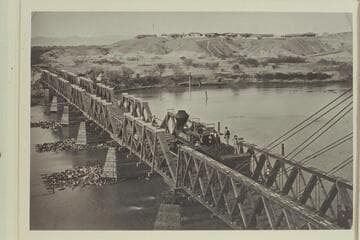 Southern Pacific Bridge at Yuma.  "The bridge was completed in '77 but it was on or about 1880, Jan. 20 that the first train crossed into Arizona.  The bridge had a lot of damage in a helluva flood in '78."