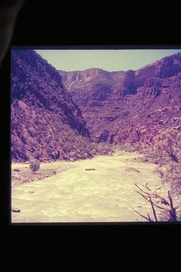 One of Hatch's pontoons bouncing rocks in lower end of Hells Half Mile