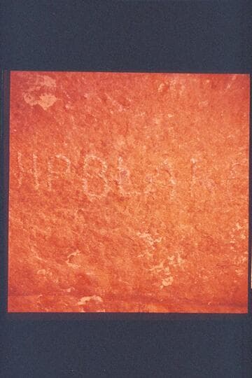 The name H.P. Blake cut near the stream in The Narrows of Bridge Canyon