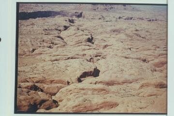 Down the drainage of the side canyon at Mile 73.6 from near Butte 6069 Rainbow