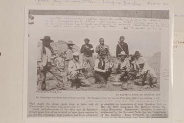 Douglass party eating melons in Piute Canyon.  Return from Rainbow Bridge