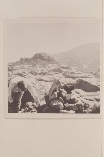 John Doerr checking a monument  on top of Butte 5014